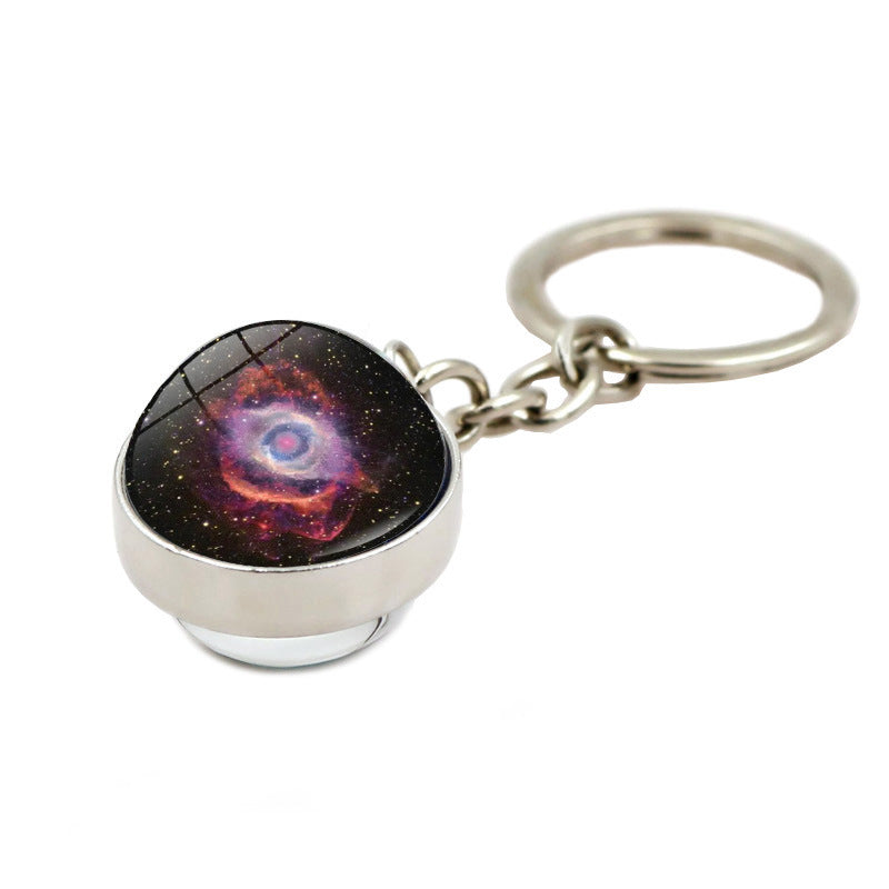 Llavero creativo al por mayor de la nebulosa de la galaxia del ojo de Dios de la aleación del cinc